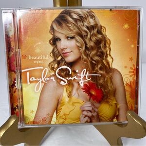 Taylor Swift Beautiful Eyes CD with Gold and Black Design